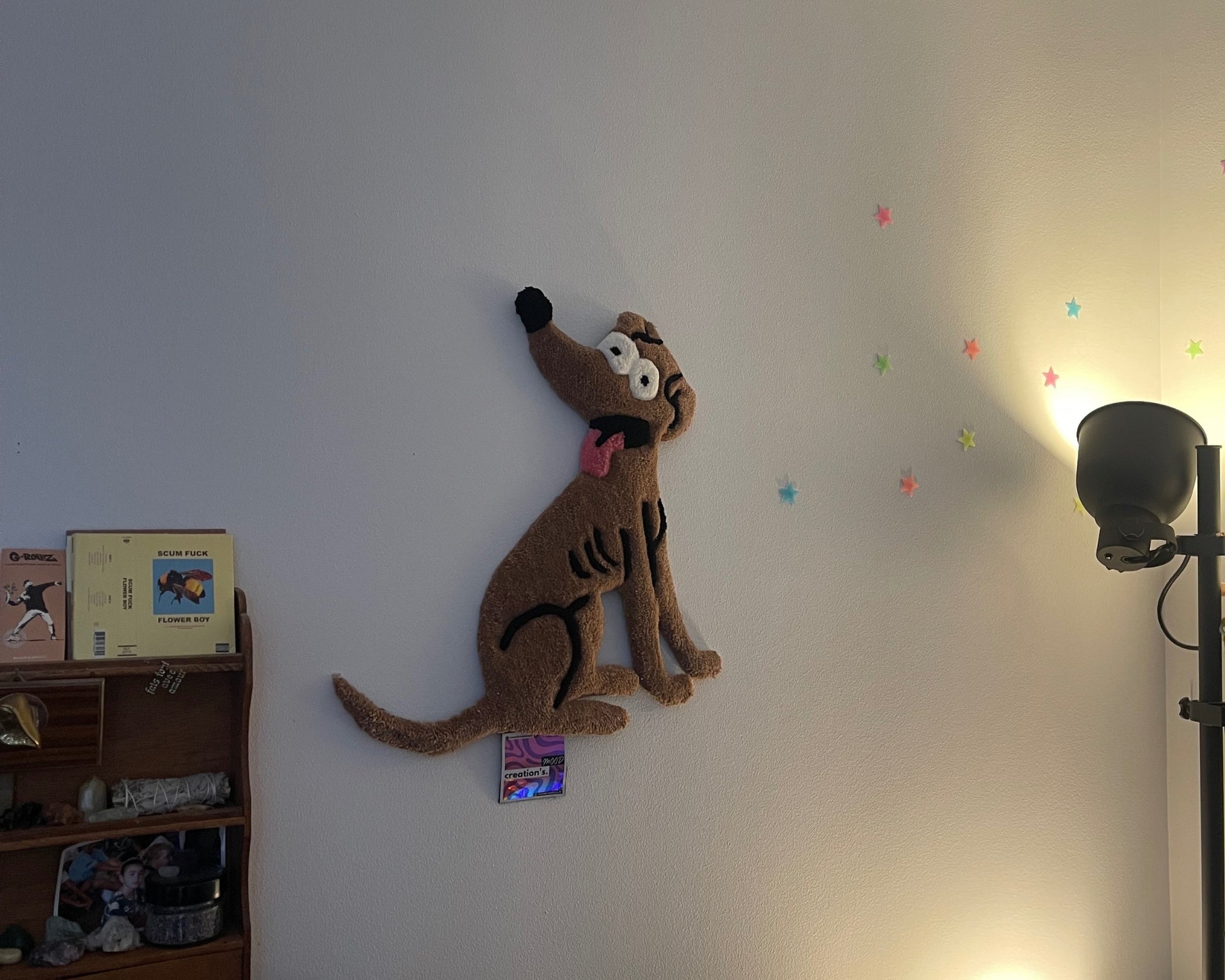 Tapis accroché au mur du chien de la série les simpsons