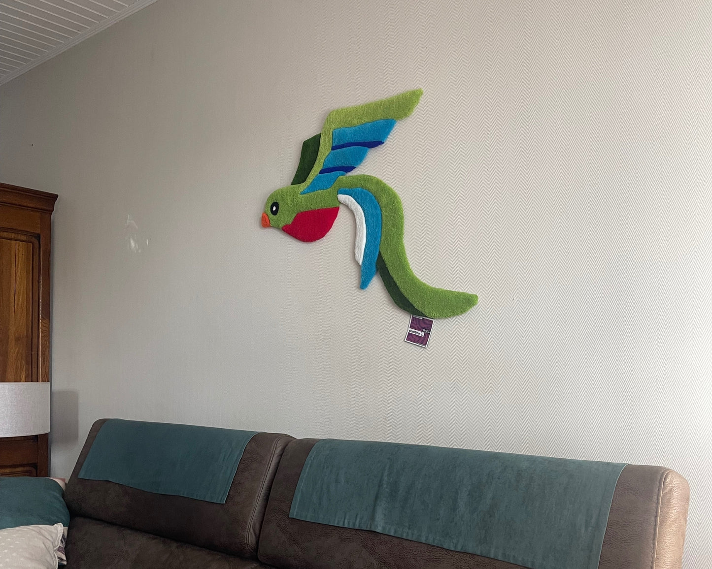 Pièce unique tufté par Mood Creations : tapis mural Quetzal, histoire et artisanat au cœur du design.